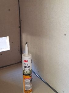 smoke shack fire block caulk 2.jpg