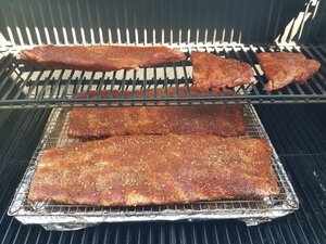 Rona ribs in grill.jpg