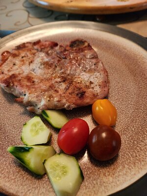 Pork chop with fresh tomato and cucumber.jpg