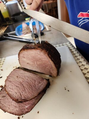 Roast beef being sliced up.jpg