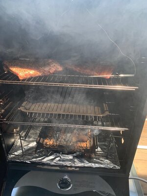 Ribs Going in Smoker.jpeg