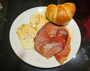 25 09 28 meacham ham slice with eggs and croissant small.jpg