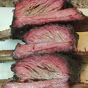 close up smoke ring beef ribs.png