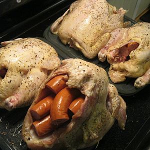 birds going in the smoker.JPG
