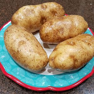 Potatos covered in oil and salt