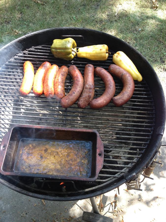 brats and peppers on Weber.JPG