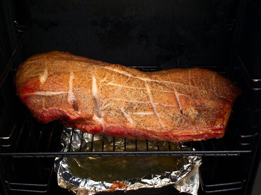 brisket in smoker 8-20-2011.jpg