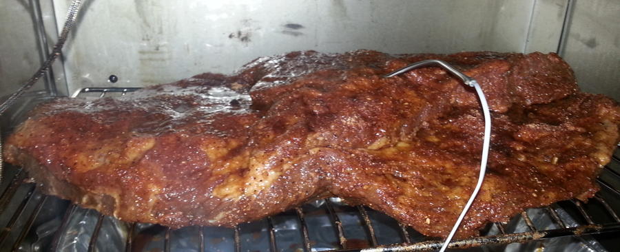 Brisket just starting on smoker.jpg