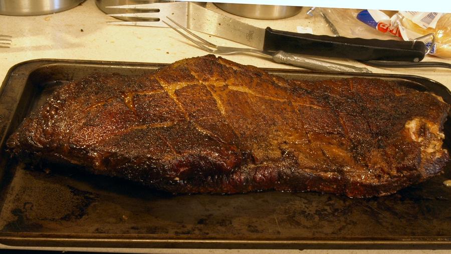 brisket out of smoker 8-20-2011.jpg