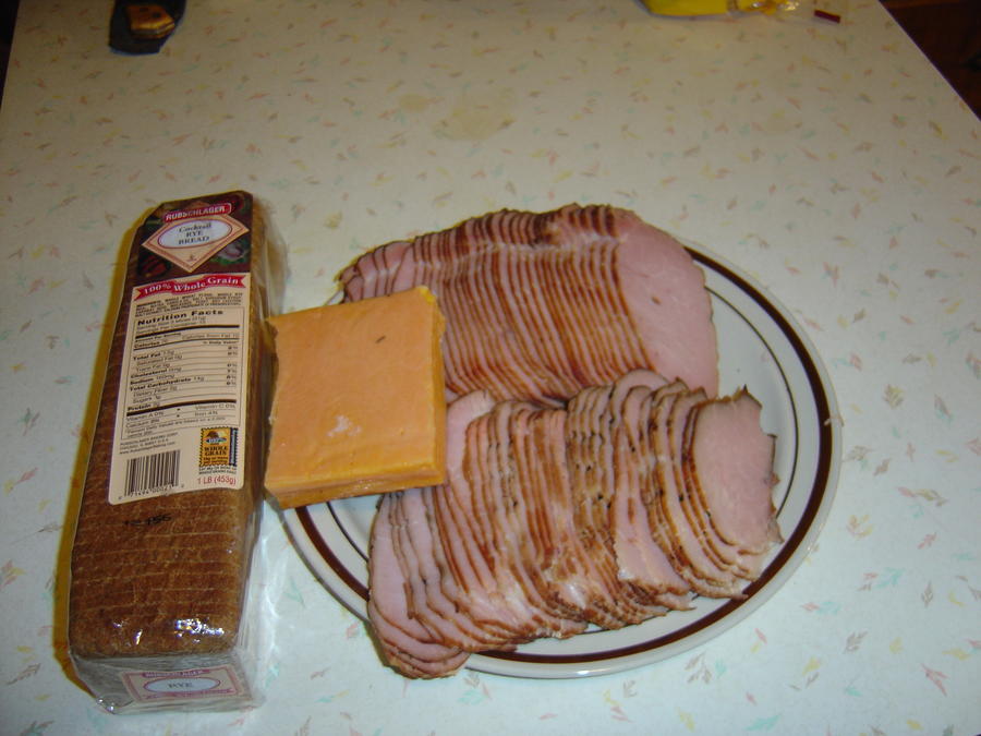 canadian bacon sliced with cheese.JPG
