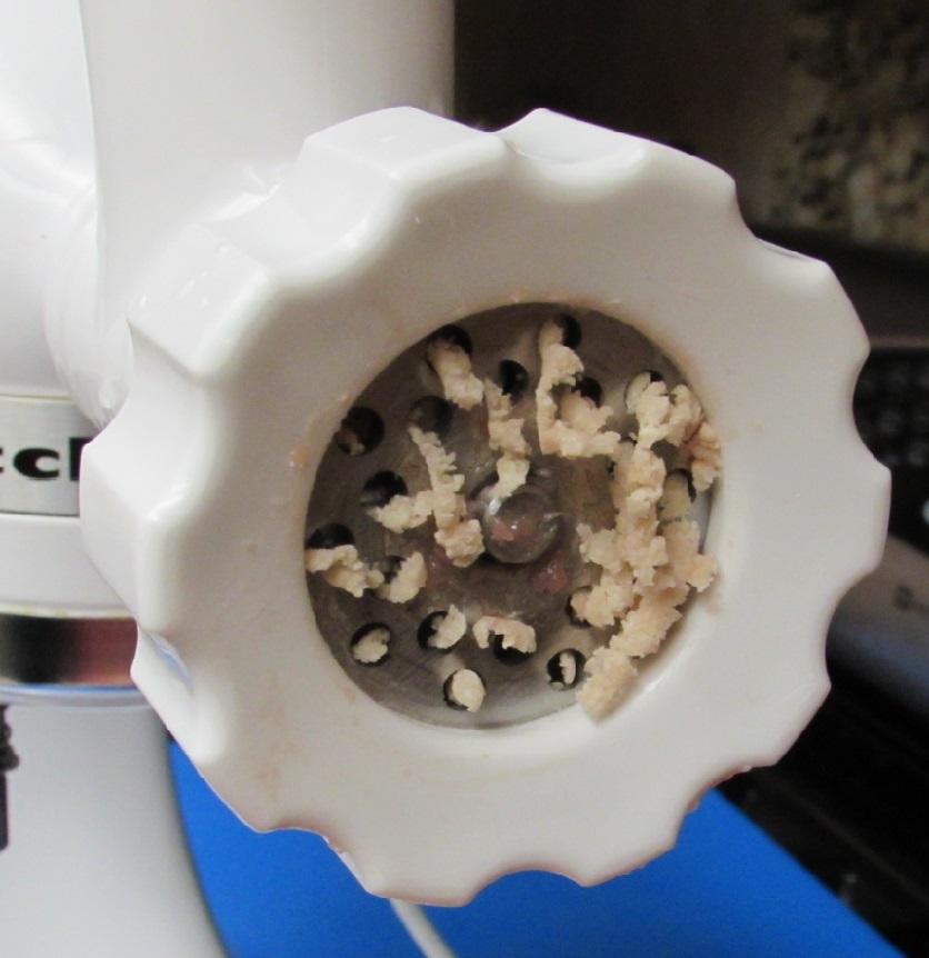 closeup bread going thru blade.JPG