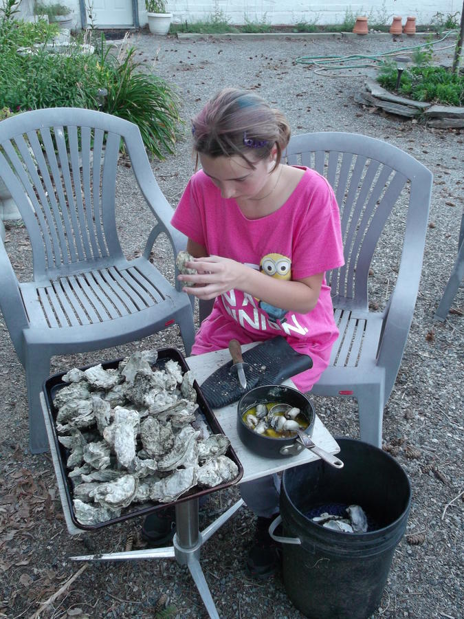 G-Daughter shucking.jpg