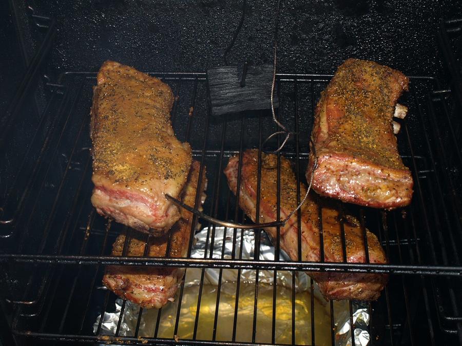 Lamb breast in the smoker 11-6-2010.jpg