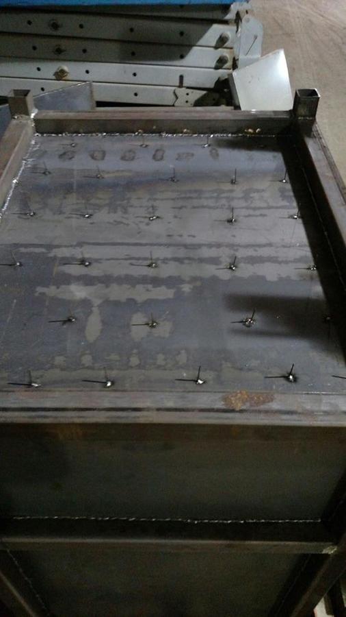 nails wellded on bottom to hold insulation.jpg