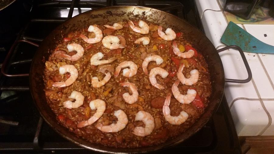 Paella cooked in the Lodge 15'' Carbon Steel Skillet on the Weber Performer  