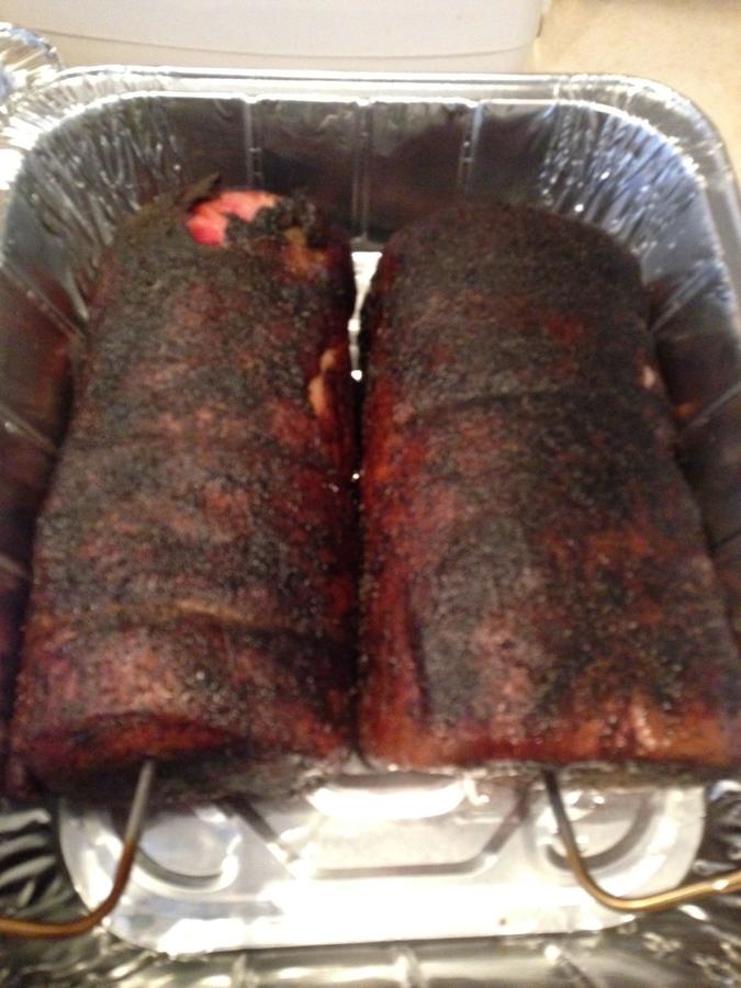 Pork out of the smoker and into the oven.jpg