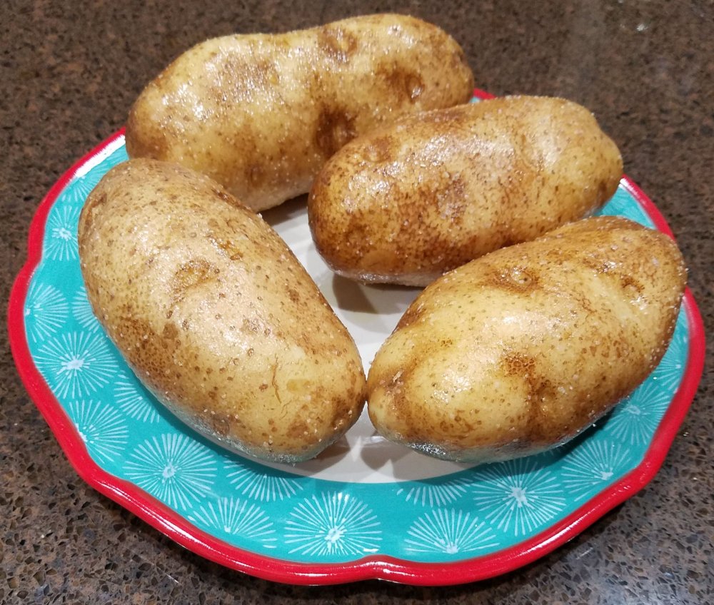 Potatos covered in oil and salt