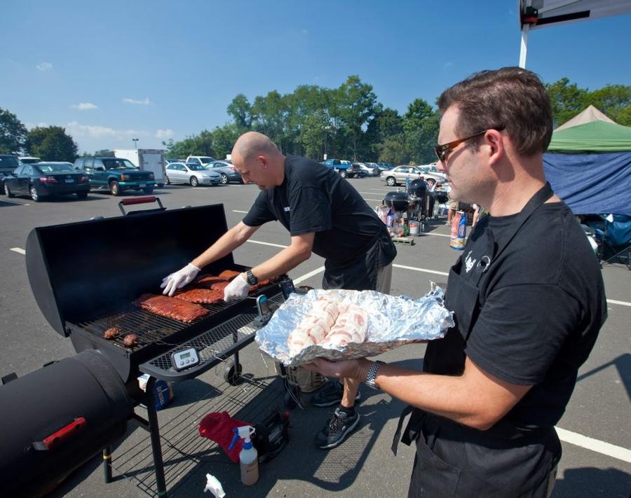 Putting the fatties on smoker.jpg
