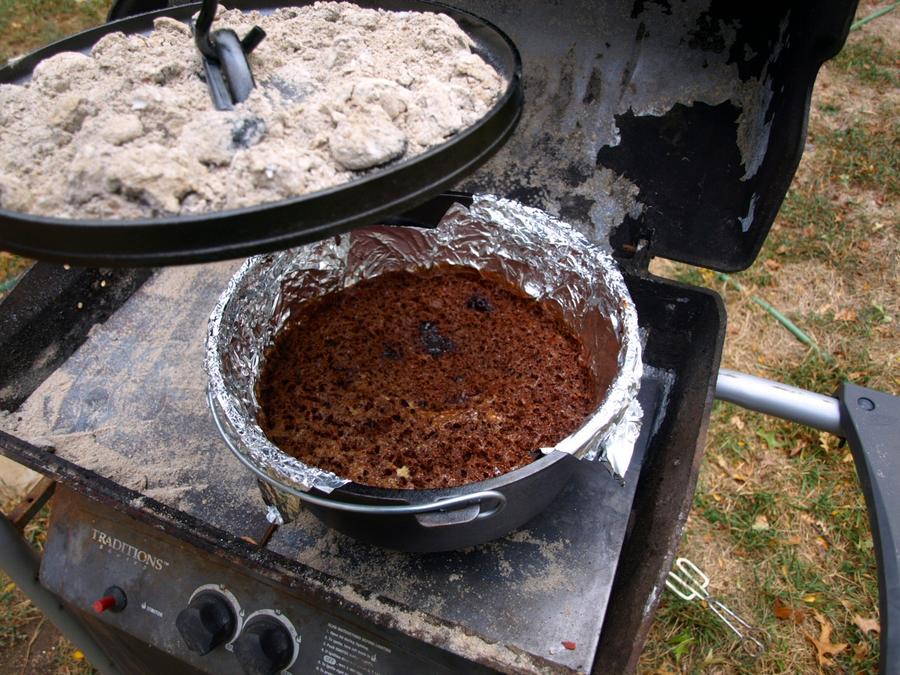 removing lid with coals 10-8-2011.jpg
