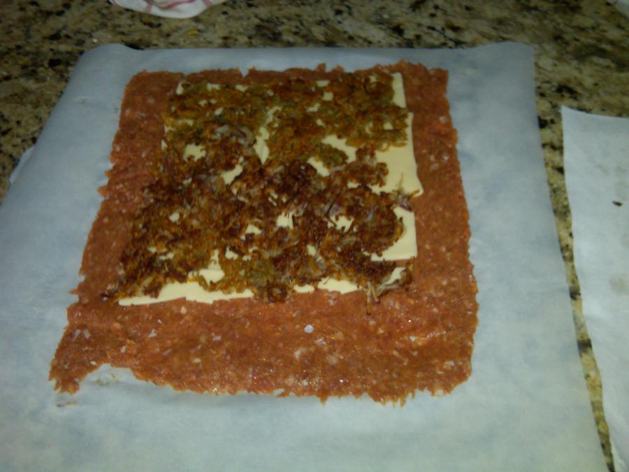 SAUSAGE W HASH BRWN AND CHS.jpg