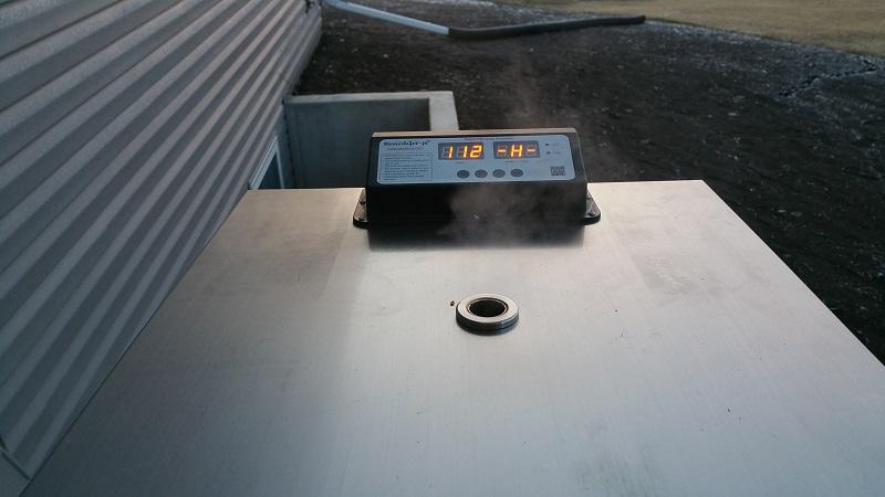 thin blue smoke coming out of smoker.jpg