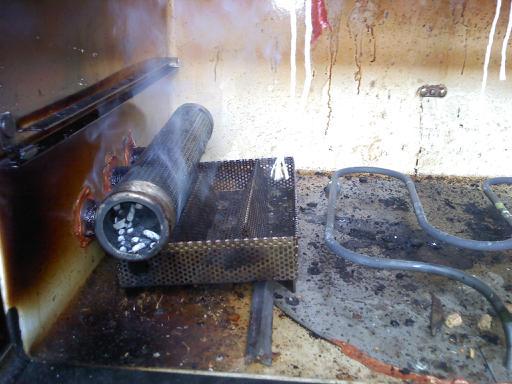 tube smoker with LEM pepper sticks.jpg