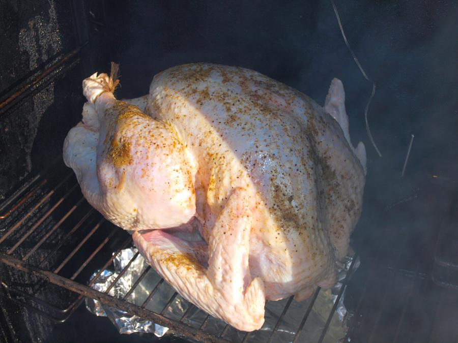 turkey in smoker 12-17-2011.jpg