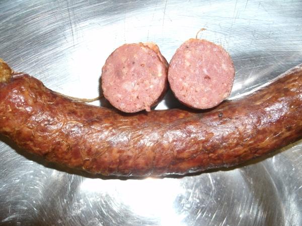 two slices, one sausage in pan.jpg